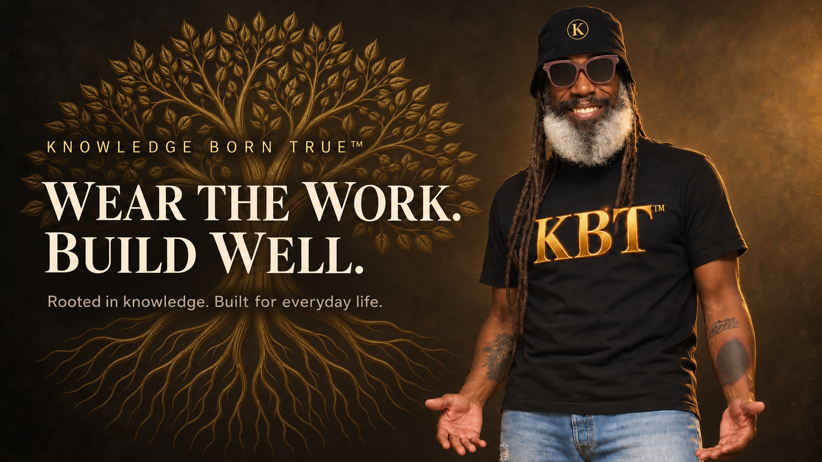 Samuel Deon Madison Sr. wearing KBT merchandise beside the Founder’s Tree. Wear the Work. Build Well.